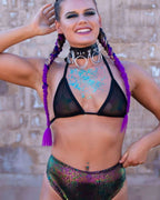 Black mesh rave top with triangle cut on model with purple braids and festival body glitter styling