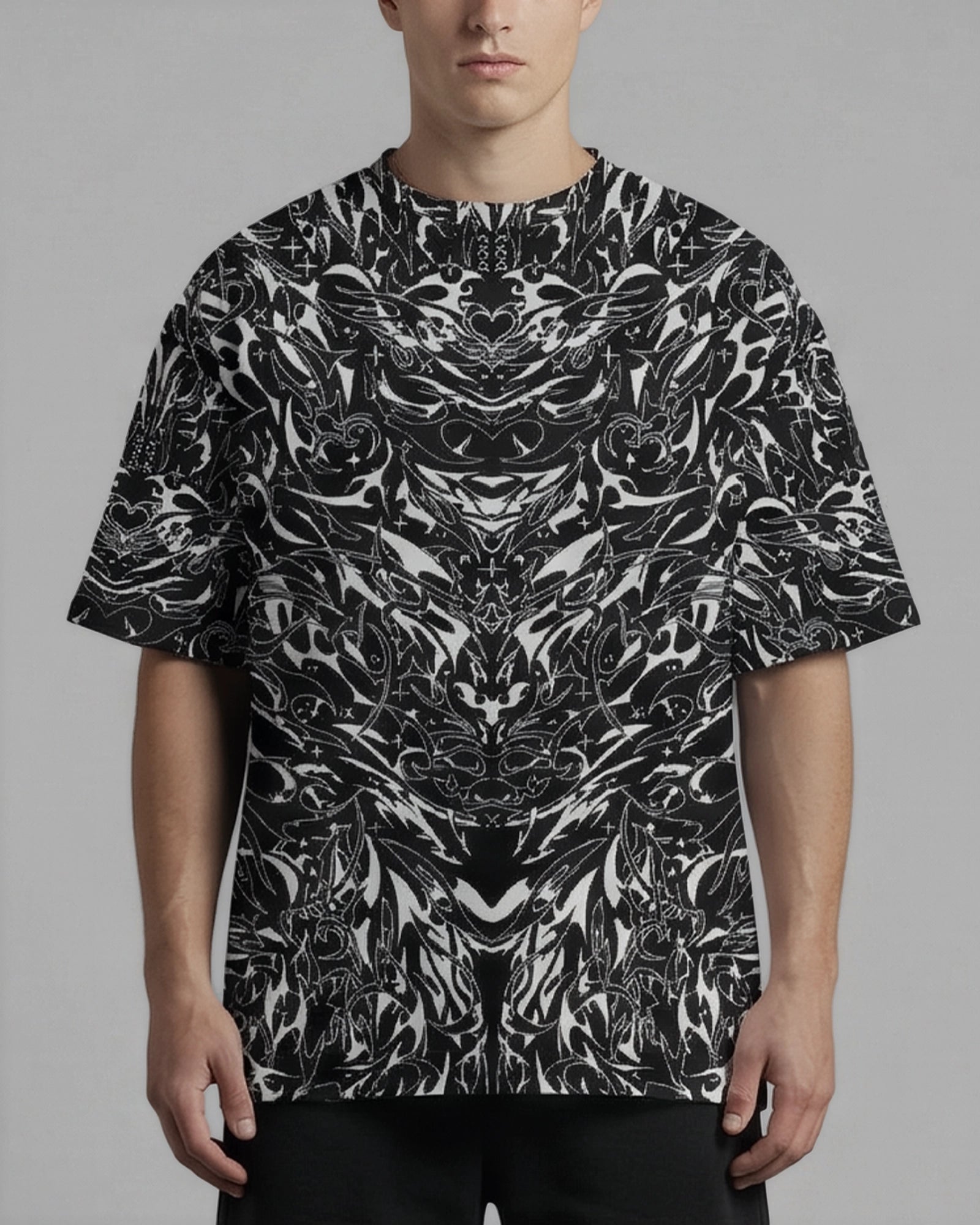 BLVDE Oversized Softee black and white abstract pattern top, front view, perfect for rave or festival wear.
