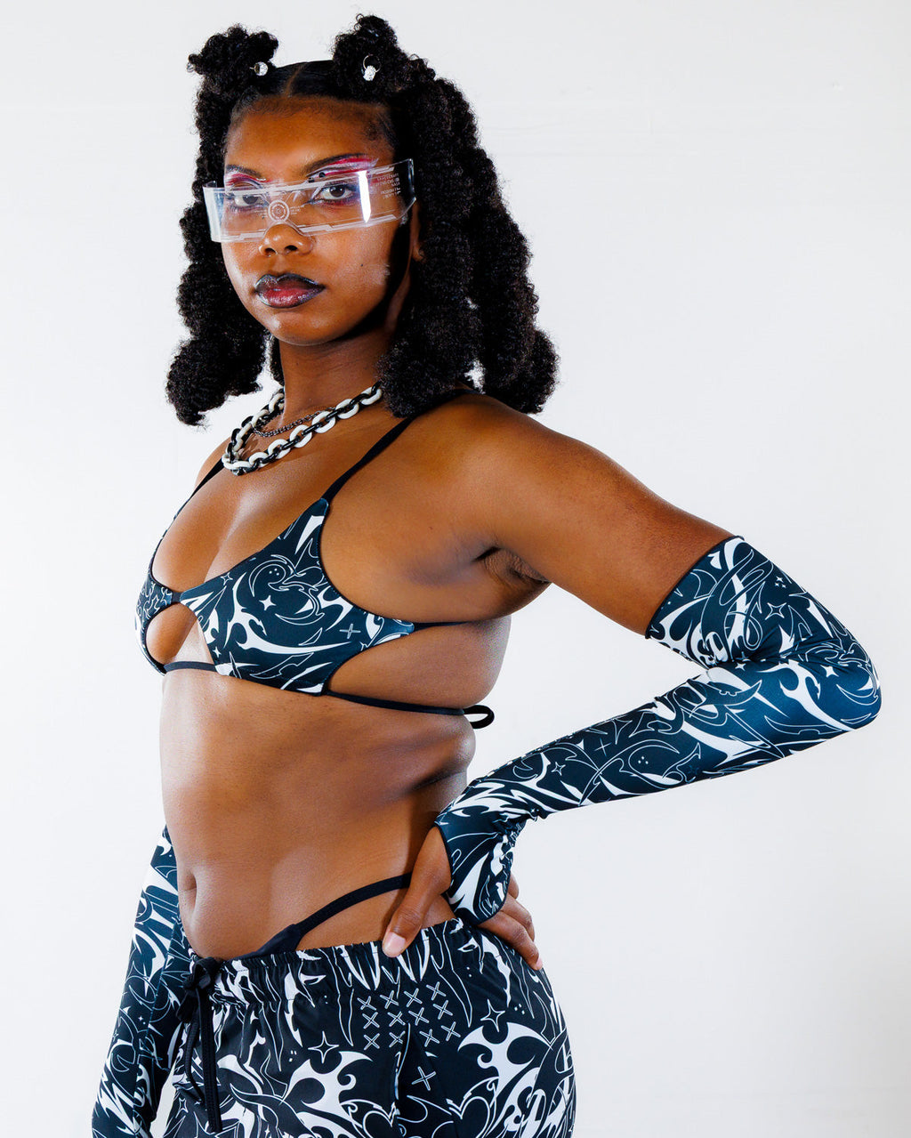 BLVDE Wonder Top in black and white pattern, worn by a model facing front, perfect for a rave festival.
