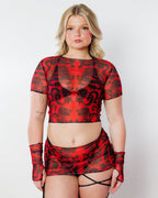 Dynasty Baby Tee in red, a sheer mesh rave top with black dragon print, worn by a model facing front.