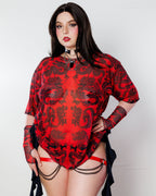 Dynasty Oversized Tee in Red, a model poses front-facing, showcasing the red mesh top with black dragon print, perfect for rave festivals.
