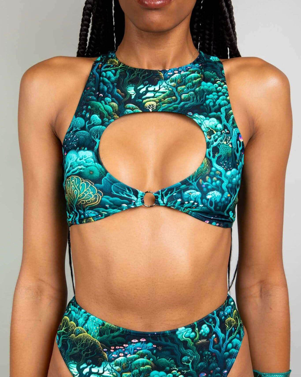 Faewood rave top with keyhole cutout in teal coral print, festival outfit front view