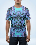 Glacial Oversized Softee rave top on a male model, featuring a mesmerizing purple and teal abstract pattern, front view.