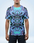 Glacial Oversized Softee rave top on a male model, featuring a mesmerizing purple and teal abstract pattern, front view.