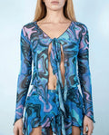 Glacial Sea Fairy Tie Top in blue, teal, lavender, and black liquid marble print, shown on a model from the front, perfect for rave festivals.