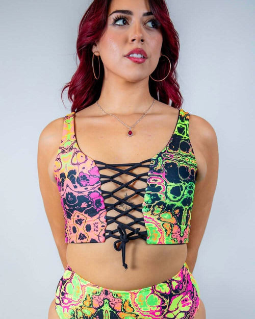Neon Intensity rave top with lace-up front in psychedelic skull print - festival outfit front view