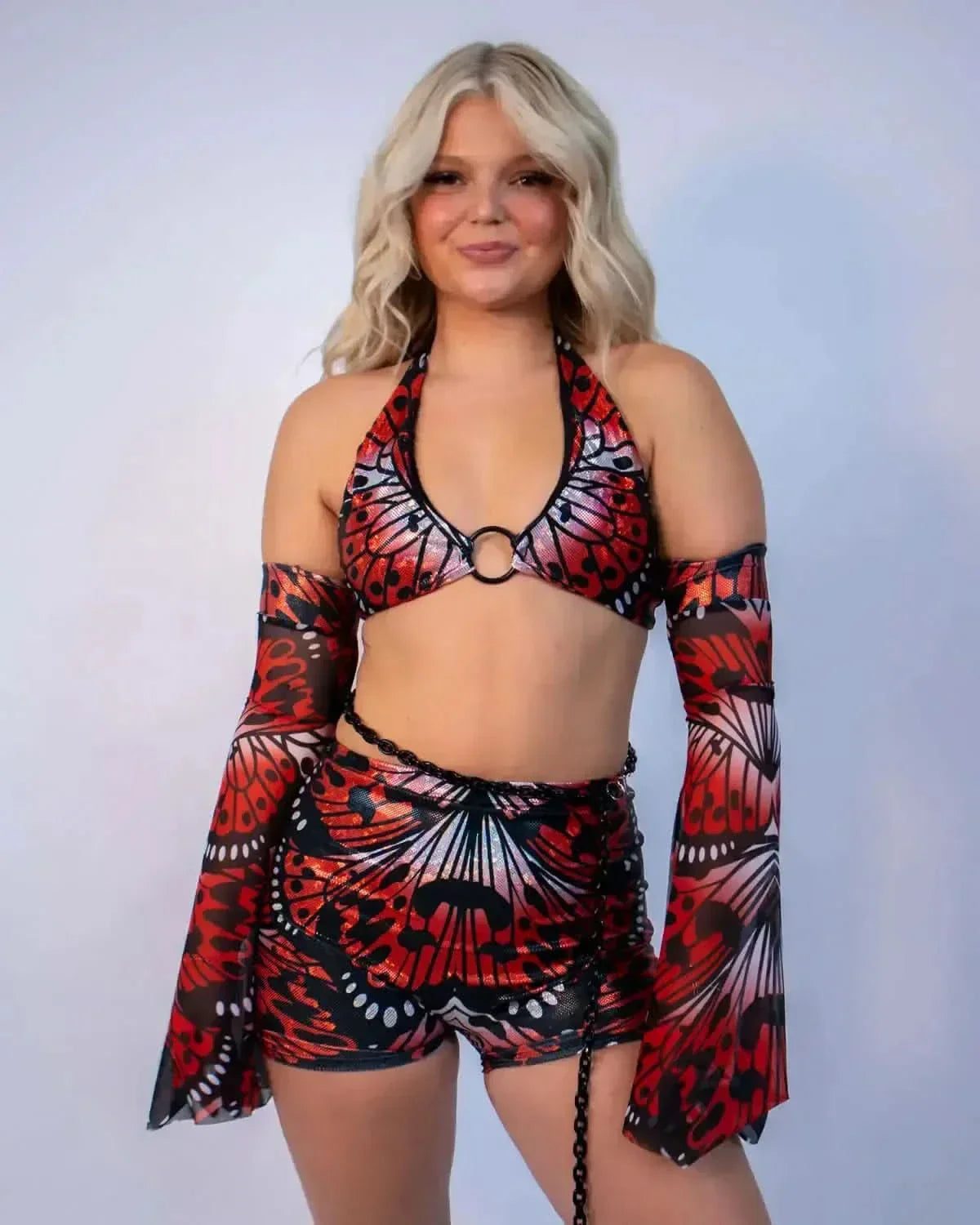 Red butterfly wing lacewing rave top with O-ring halter detail on model front view festival outfit