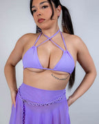 Lavender strappy rave top with crisscross chest design modeled against white background for festival outfit styling
