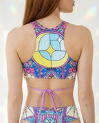 Moonlight Teaser Top with Straps shown from the back, featuring a pastel stained-glass rave design