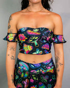 Vibrant psychedelic rave top with mushroom print, off-shoulder ruffles and sweetheart neckline for festival outfits
