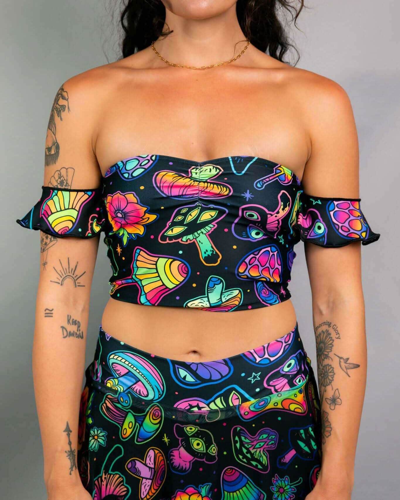 Vibrant psychedelic rave top with mushroom print, off-shoulder ruffles and sweetheart neckline for festival outfits