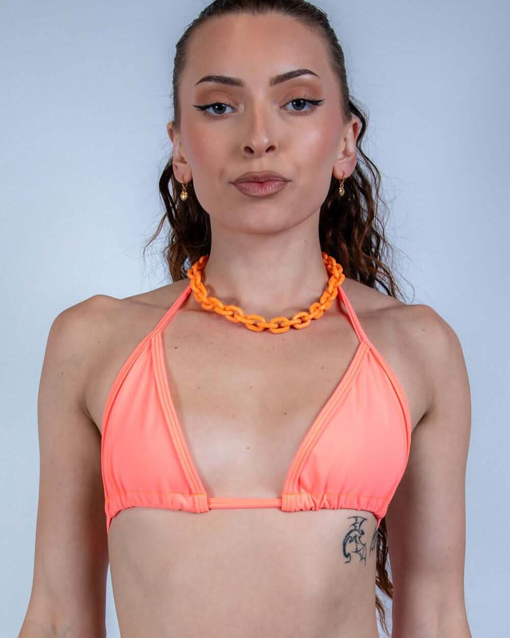 Valencia coral rave top bikini with chain necklace modeled front view for festival outfit styling