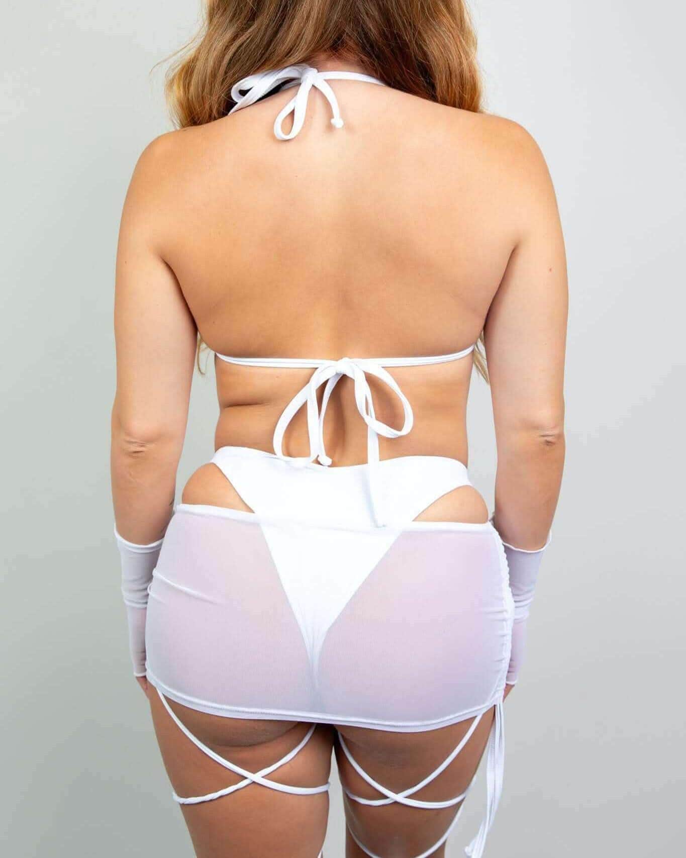 White mesh rave top back view showing strappy bikini design with matching festival outfit accessories