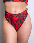 Red Void High Waisted Thong showcasing soft, stretchy fabric, perfect for rave outfits and designed for extra cheeky comfort.