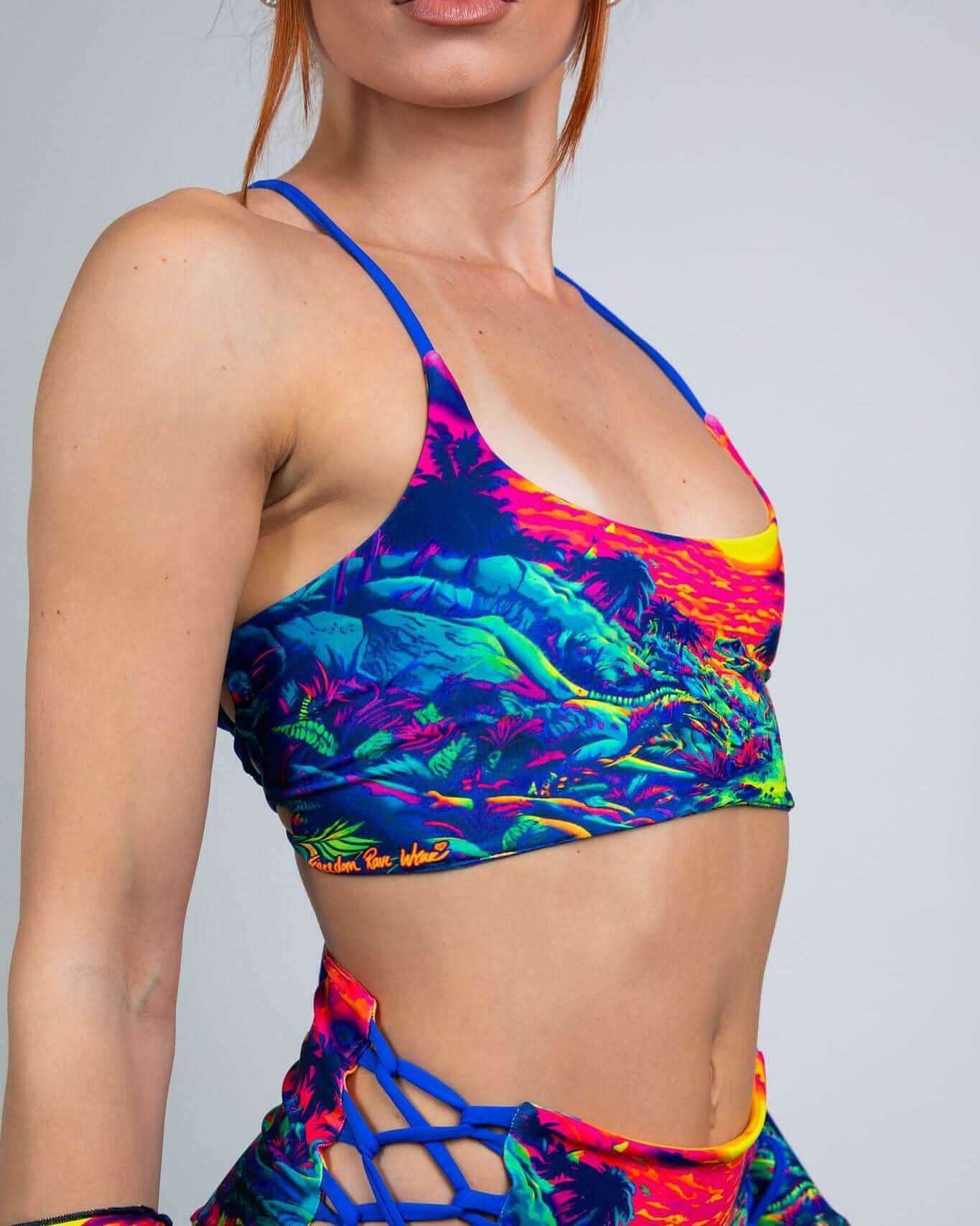 Colorful Saurian reversible rave top in neon tropical print - front view festival outfit on model