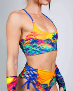 Saurian reversible rave top bikini style in tropical dinosaur print with blue strappy details front view