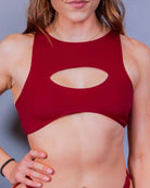 Scarlet Cutout Teaser Top showcasing an oculus cutout design, perfect for rave outfits and sultry summer vibes.
