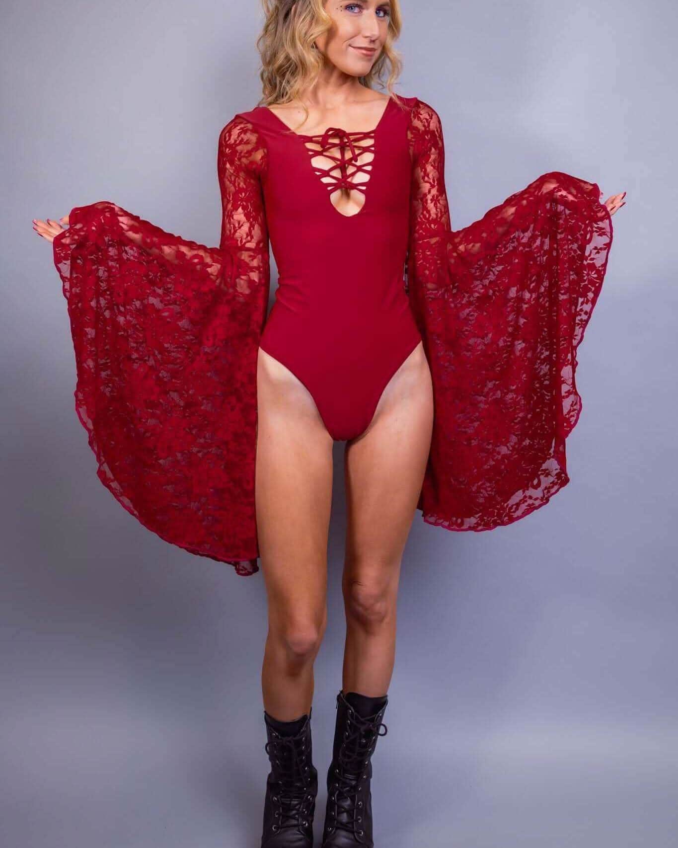 Scarlet Goddess Bodysuit with lace up chest and dramatic circle sleeves, perfect for rave outfits and festivals.