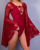 Scarlet Goddess Bodysuit with lace-up chest and dramatic lace sleeves, perfect for rave outfits and stylish events.