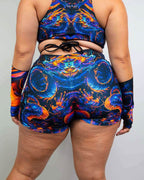 ShadowFlame dragon print rave pants back view showing high waist design and vibrant blue orange festival outfit