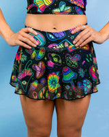 Vibrant Shroomie! Mesh Skort featuring a trippy mushroom print, perfect for stylish rave outfits.