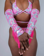 Pink sequined Strawberry Milkshake rave arm sleeves with fringe worn with matching bikini top festival outfit