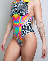 Colorful Technicolor bodysuit with psychedelic patterns, perfect for rave outfits and festivals.