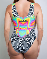 Colorful Technicolor bodysuit with psychedelic patterns, perfect for rave outfits and festivals.