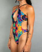 Vivid Halo Bodysuit in colorful psychedelic design, perfect for raves and parties with high-hip cut and keyhole detail.