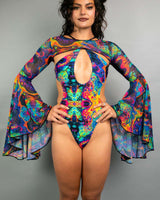 Model wearing Vivid Mesh Bell Sleeves rave outfit with colorful patterns and dramatic bell sleeves for festival style.