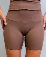 Brown Coco ribbed lounge boxer shorts showcasing soft, stretchy fabric, perfect for comfort and stylish rave outfits.