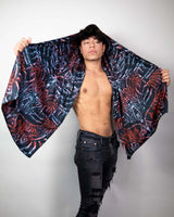 Model showcasing the Darkness Festival scarf, highlighting its unique design and versatility for rave outfits.
