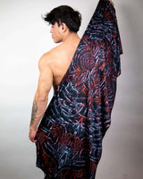Model showcasing the handmade Darkness Festival Scarf, styled for a rave outfit, emphasizing its soft, lightweight fabric.