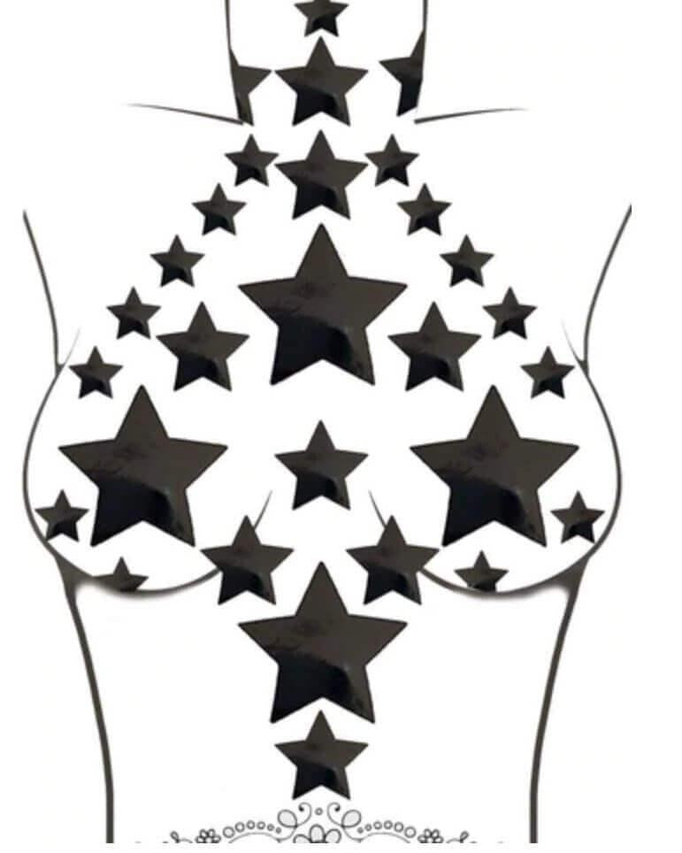 Black star-shaped nipple stickers on a torso for trendy rave outfits and bold fashion statements.