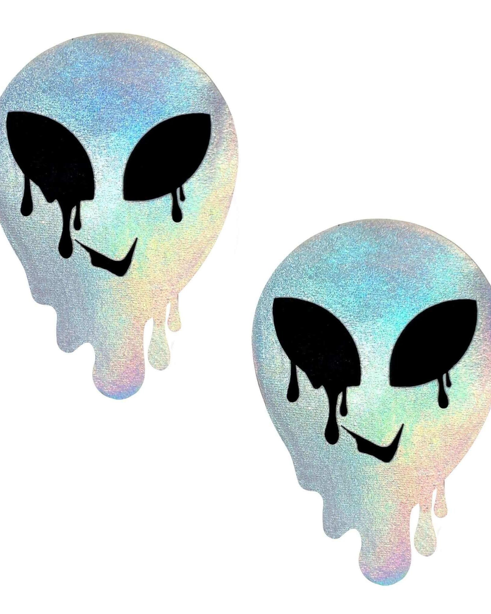 Drippy alien holographic rainbow pasties for rave outfits, featuring black alien faces with colorful dripping effects.