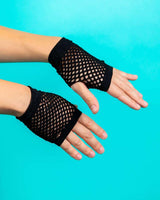 Black fishnet gloves shown on hands, perfect for adding flair to rave outfits and festival looks. Soft and stretchy material.