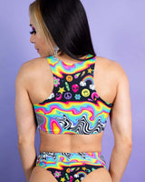 Back view of HAPPIER Teaser Top featuring colorful rainbow design, ideal for unique rave outfits and EDM lovers.