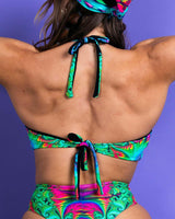 Back view of a colorful Hypnotic O Ring Halter Top and matching bottoms, perfect for rave outfits.