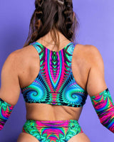 Vibrant back view of a colorful Hypnotic Teaser crop top, perfect for rave outfits.