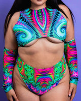Colorful Hypnotic Teaser Top with underboob cut, perfect for rave outfits, showcasing vibrant patterns and stylish design.