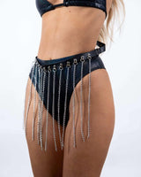 Stylish black high-waisted shorts with silver chain detailing, perfect for rave outfits and edgy festival looks.