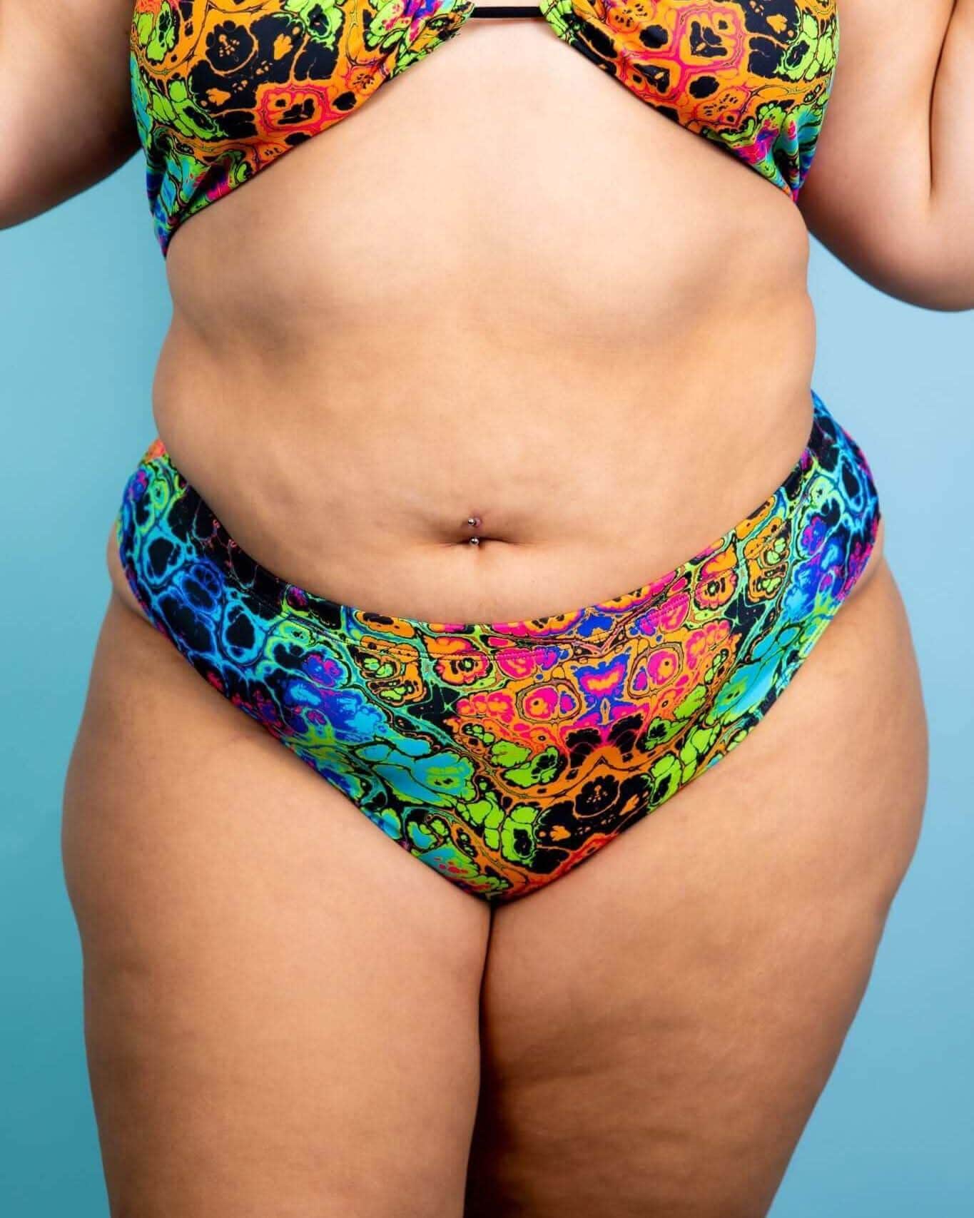 Lucidity High Waisted Thong in psychedelic rainbow design, perfect for rave outfits and showcasing your unique style.