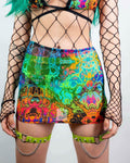 Lucidity Mesh Extra Mini Skirt featuring psychedelic rainbow design, perfect for rave outfits and festival fashion.