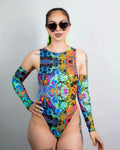 Model showcasing the Lucidity Sideboob Bodysuit with psychedelic rainbow print, perfect for rave outfits.