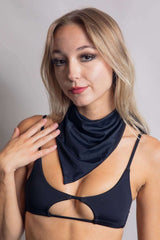 Model showcasing a matte black bandana, perfect for rave outfits, styled in multiple ways for festivals.