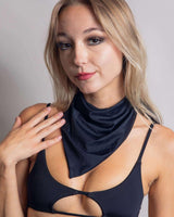 Model showcasing a matte black bandana, perfect for rave outfits, styled in multiple ways for festivals.