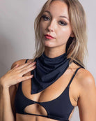 Model showcases a matte black bandana, perfect for rave outfits, adding a chic touch to festival attire.