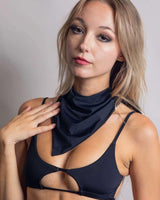 Model showcases a matte black bandana, perfect for rave outfits, adding a chic touch to festival attire.
