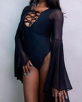 Matte Black Goddess Bodysuit featuring lace-up details and dramatic circle sleeves, perfect for rave outfits.