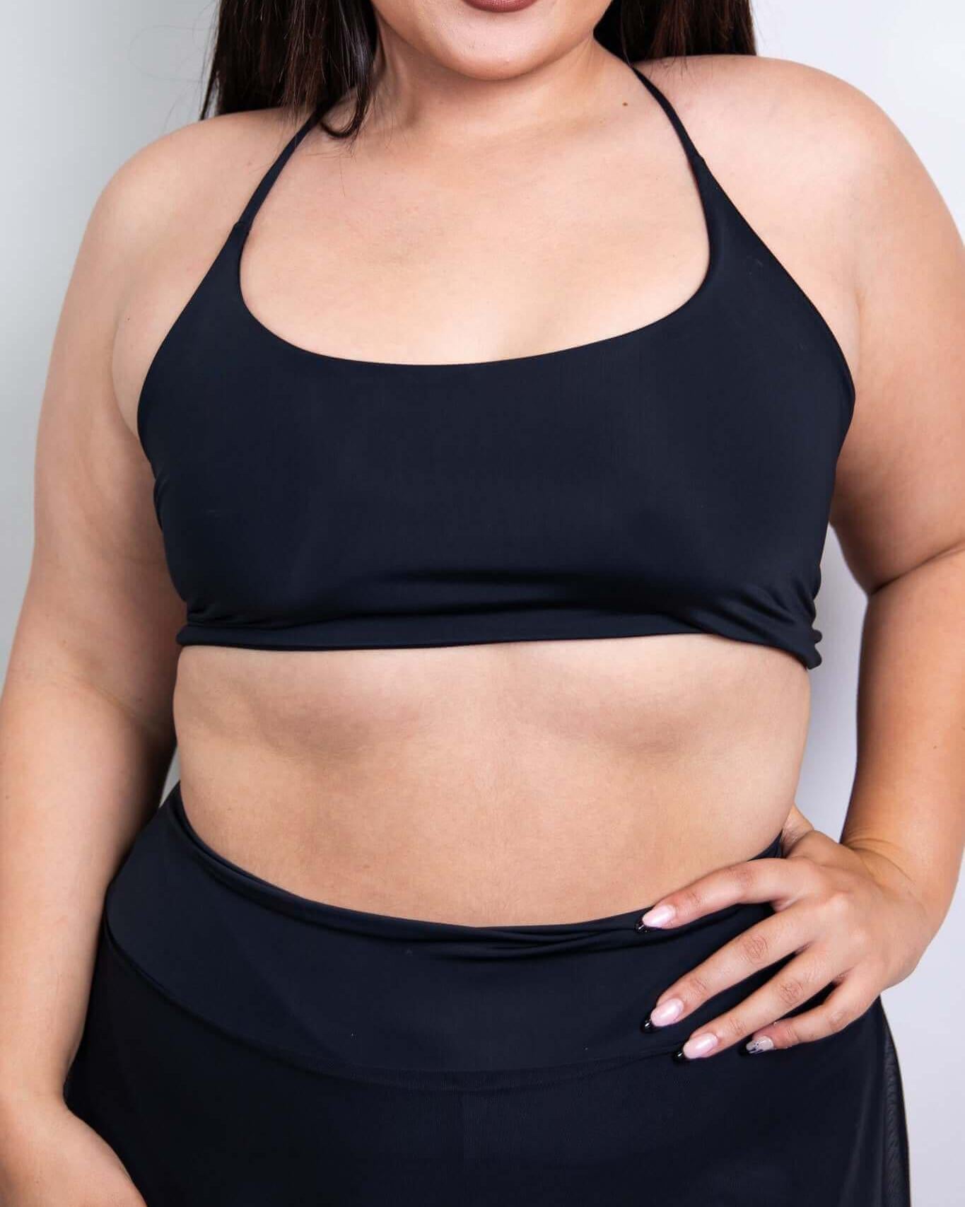 Model showcasing the Matte Black Lush top, perfect for rave outfits and stylish summer looks.